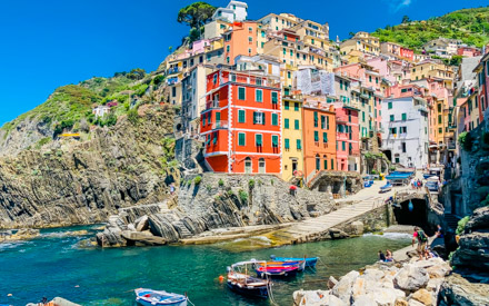 Colorful houses and boats in the harbor, Riomaggiore, Cinque Terre