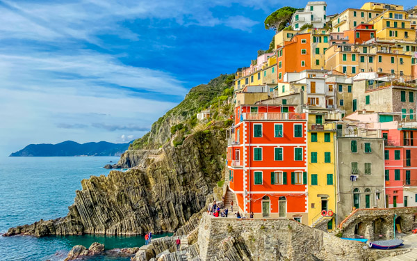 Colorful houses that bring the port to life, Riomaggiore, Cinque Terre